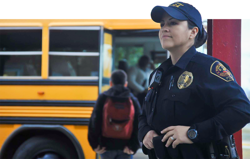 Michelle E. Quick-Reyes, school resource officer, Quantico Middle/High School, makes sure that the students get aboard the buses safety right after the dismissal bell Jan. 14. (U.S. Marine Corps photo by Lance Cpl. Antwaun L. Jefferson/Released)